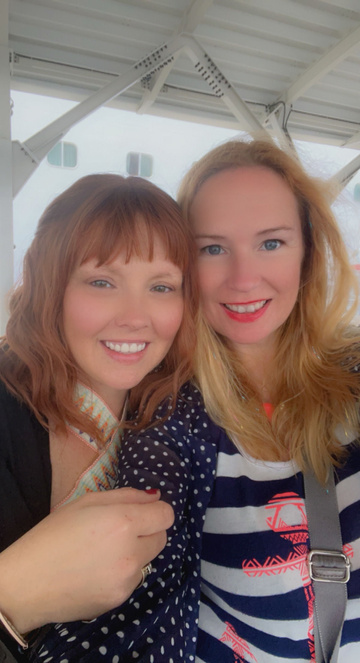 Cheryl and Denise taking a selfie on a boat in Nassau